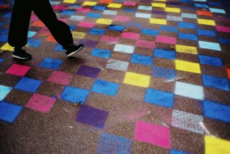 a person walking on a painted floor 